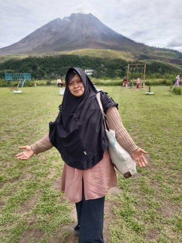 Dra. Siti Fatimah
